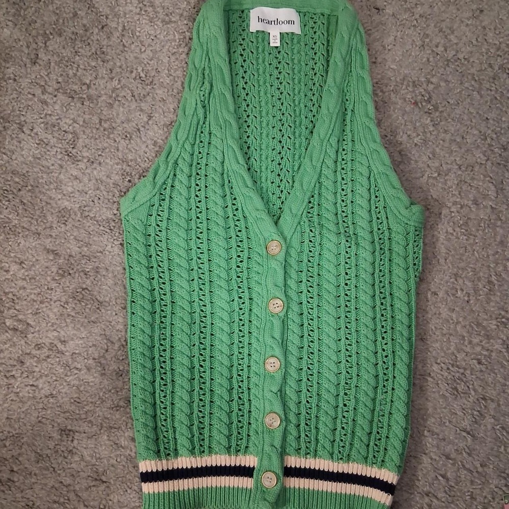 Womens Green Heartloom cable sweater vest with gold detail buttons.